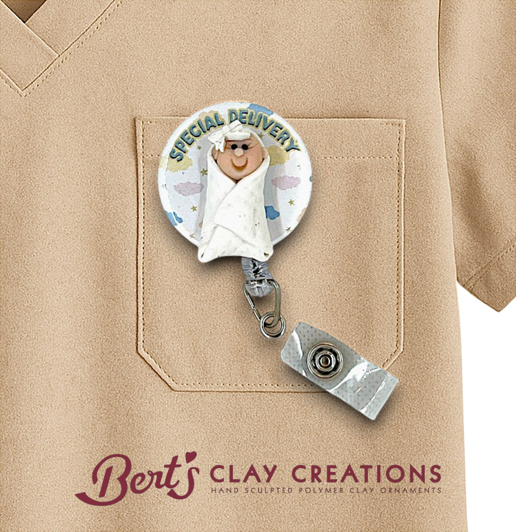 Badge holder with a bear ornament labeled 'Special Delivery' on a beige shirt, featuring 'Bert's Clay Creations' branding.