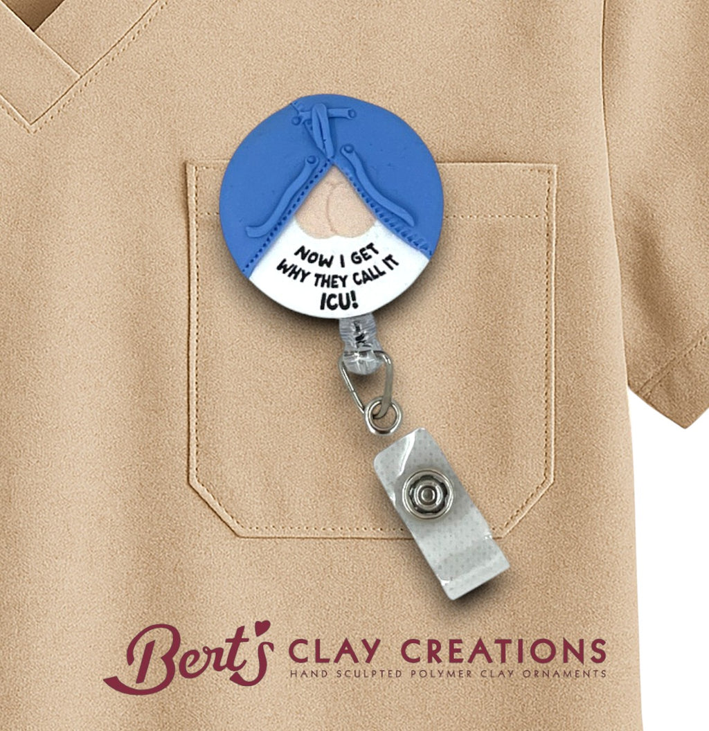 Badge holder with humorous text on a beige shirt, featuring 'Bert's Clay Creations' logo.