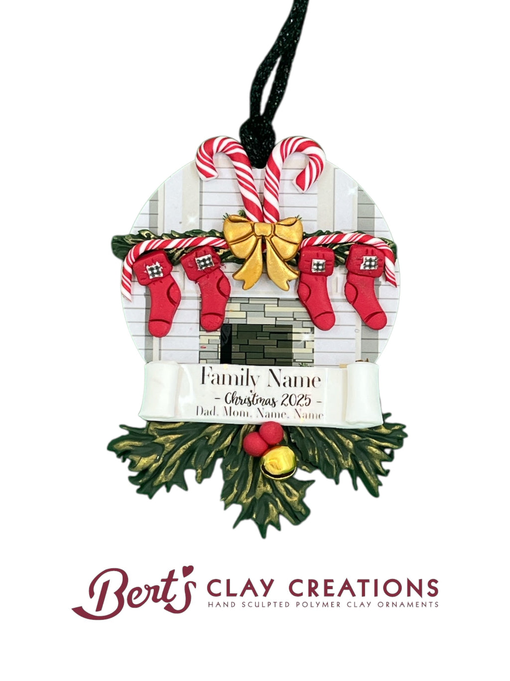 • 	Hand-sculpted polymer clay ornament with festive fireplace scene
• 	Four red stockings hanging from candy cane-trimmed mantle
• 	Customizable banner with family name, year, and member names
• 	Holly leaves and berries at the base of the ornament
• 	Black ribbon for hanging
• 	Personalized Christmas ornament for families
• 	Holiday keepsake from Bert’s Clay Creations
• 	Cozy and colorful handmade decoration