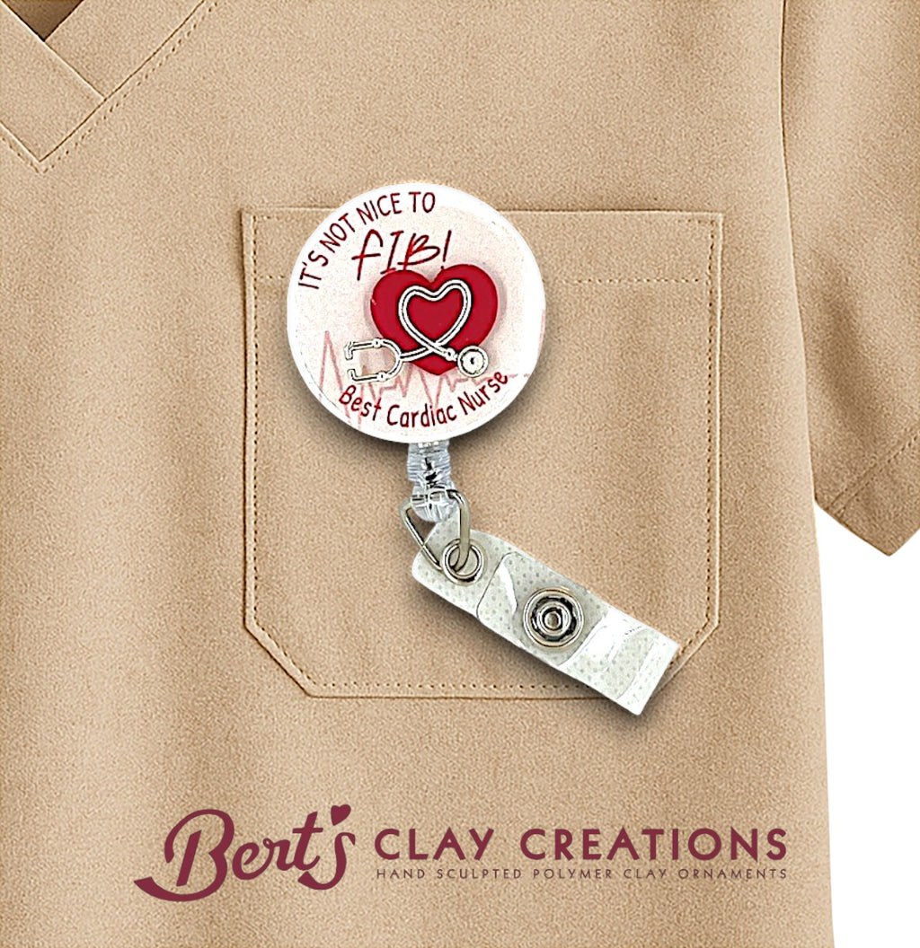 Cardiac themed Retractable badge holder with heart design and text on a beige shirt, featuring 'Bert's Clay Creations' branding.